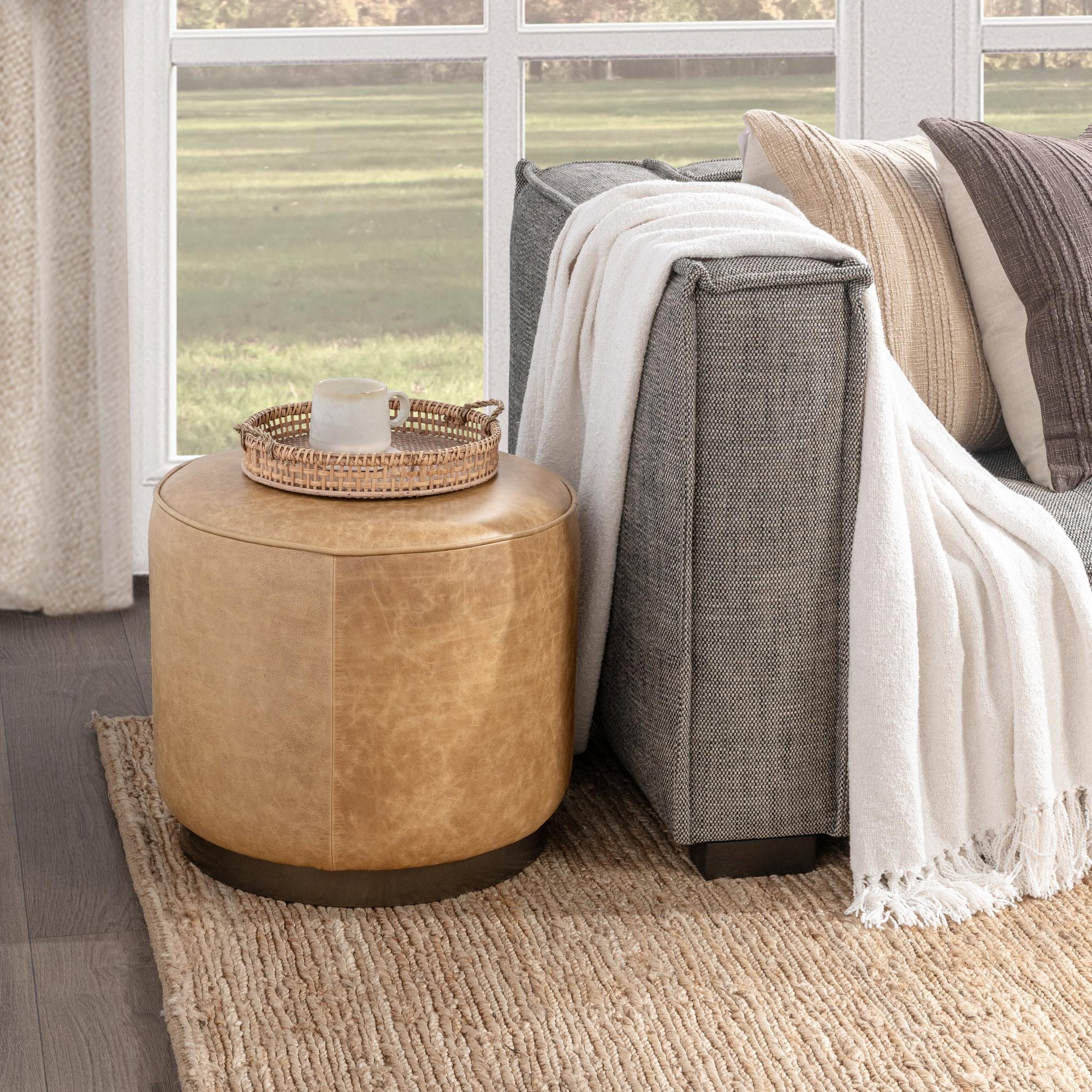 Clair 20" Round Ottoman - Sedona Brown