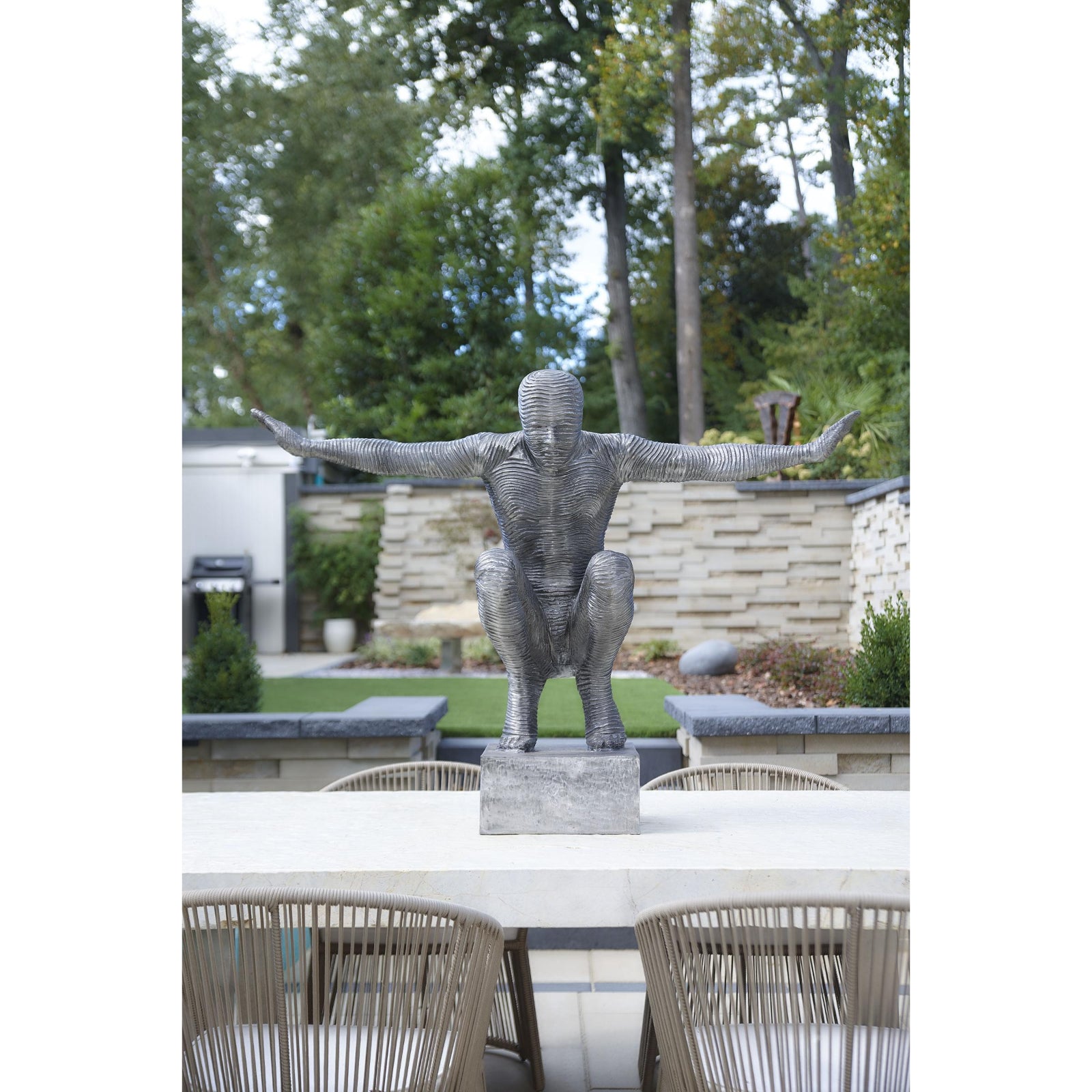 Outstretched Arms Sculpture