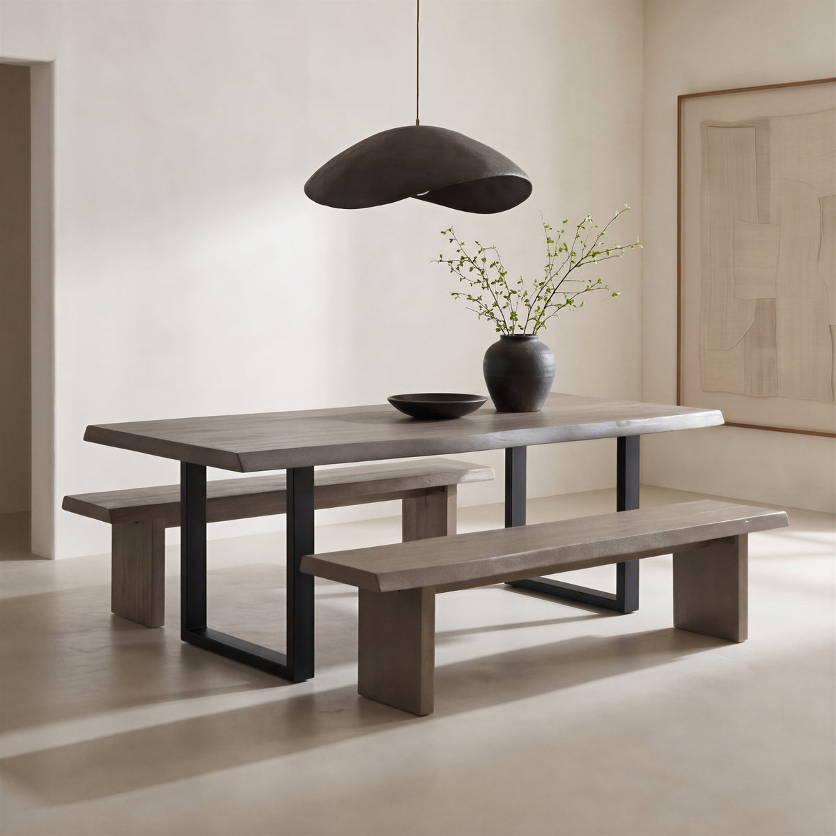 Brooks Dining Table - U Base by Urbia, side view with twin benches beneath a sculptural pendant