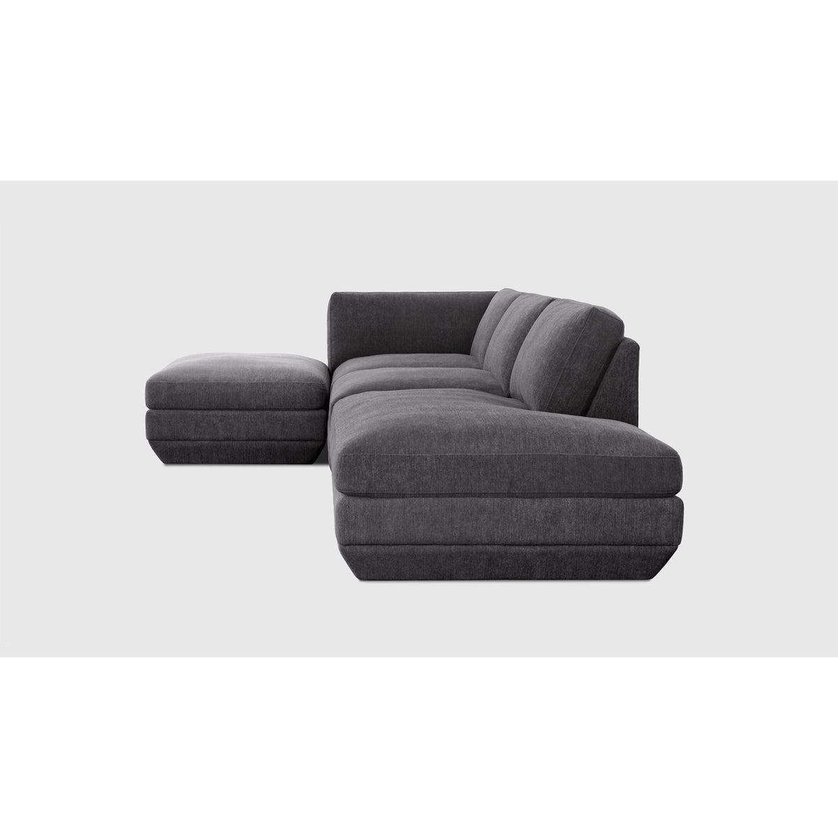 Podium Modular 4PC Lounge Sectional B - LF by Gus* — charcoal-gray upholstery, chaise-end angled studio view