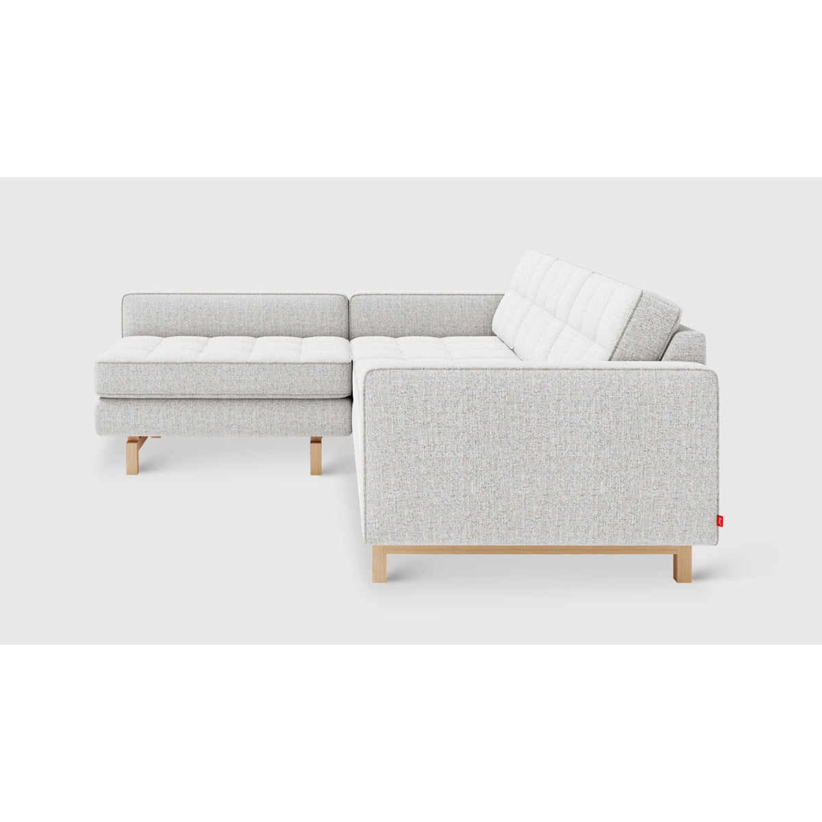 Jane 2 Loft Bi-Sectional by Gus* — side profile highlighting the chaise, piped upholstery and light wood base