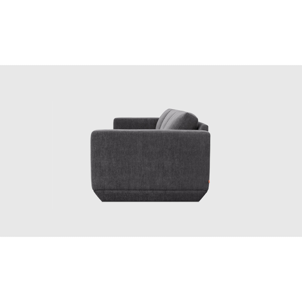 Podium Modular 3PC Sofa by Gus* — side profile in charcoal upholstery with a low arm and deep cushions