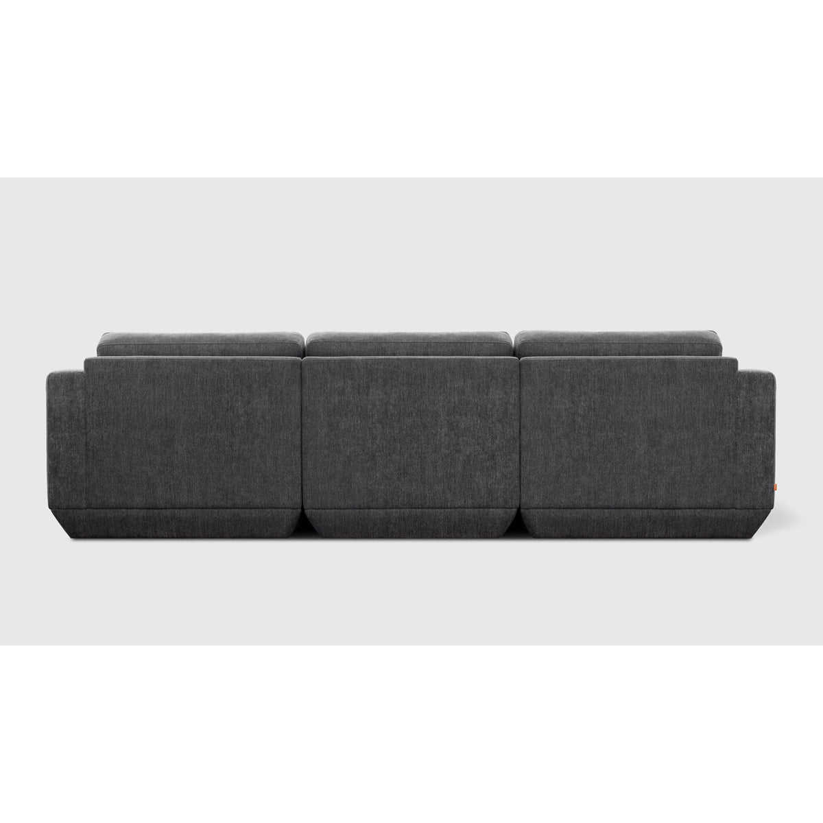 Podium Modular 3PC Sofa by Gus* — rear view in charcoal upholstery showing three modular back panels