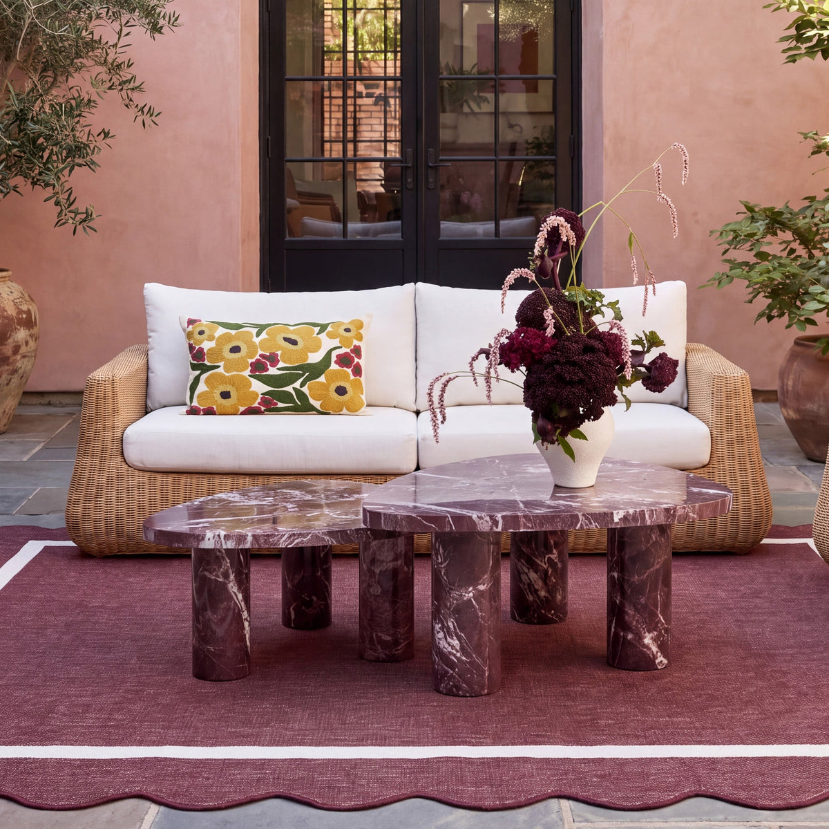 Dana 85" Outdoor Sofa by TOV Furniture — cream performance boucle cushions and resin wicker in a patio setting