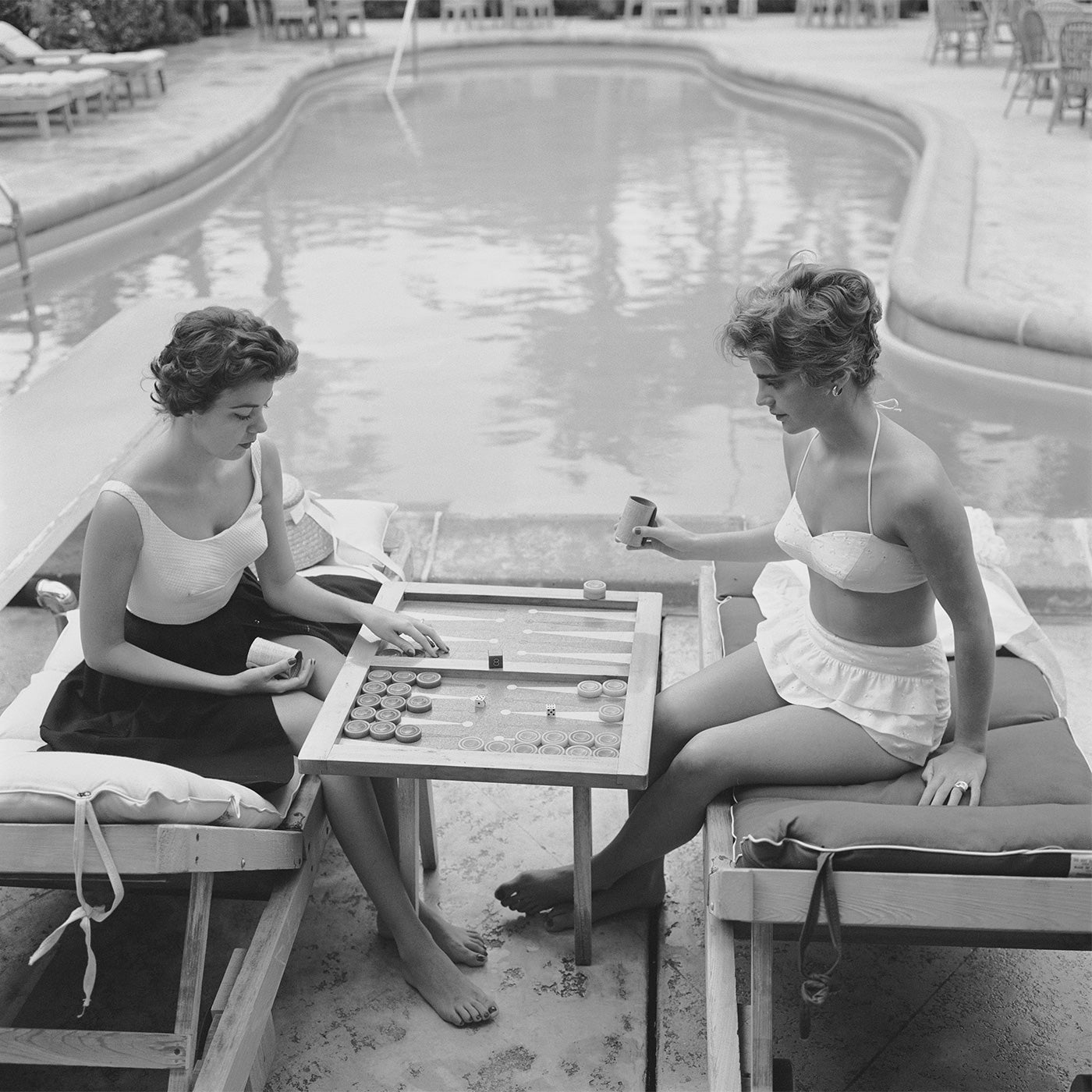 Slim Aarons "Backgammon By The Pool" Photograph Art Studio Jonathan Adler 20" X 20" , Black Friday Sale Jonathan Adler Furniture Sale, Old Bones Co, Mid Century Furniture Sale, Four Hands Furniture, Black Friday Sale Slim Aarons "Backgammon By The Pool" Photograph,Gus Sale, Perigold Slim Aarons "Backgammon By The Pool" Photograph Art Studio Black Friday Sale , Perigold Sale Slim Aarons "Backgammon By The Pool" Photograph,Slim Aarons "Backgammon By The Pool" Photograph Lulu and Georgia, Burke Decor Sale Slim
