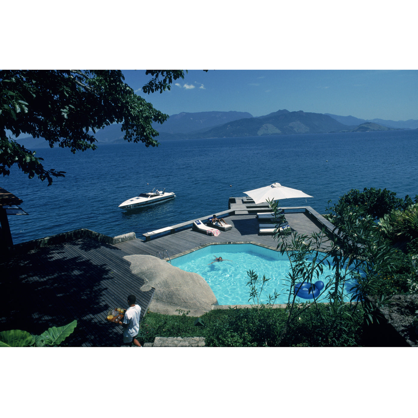 Slim Aarons "Pool By The Sea" Photograph Art Studio Jonathan Adler , Black Friday Sale Jonathan Adler Furniture Sale, Old Bones Co, Mid Century Furniture Sale, Four Hands Furniture, Black Friday Sale Slim Aarons "Pool By The Sea" Photograph,Gus Sale, Perigold Slim Aarons "Pool By The Sea" Photograph Art Studio Black Friday Sale , Perigold Sale Slim Aarons "Pool By The Sea" Photograph,Slim Aarons "Pool By The Sea" Photograph Lulu and Georgia, Burke Decor Sale Slim Aarons "Pool By The Sea" Photograph, www.old