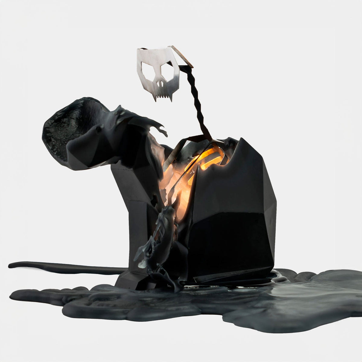PyroPet Kisa Black cat candle by 54Celsius, melted wax revealing the metal cat skeleton.