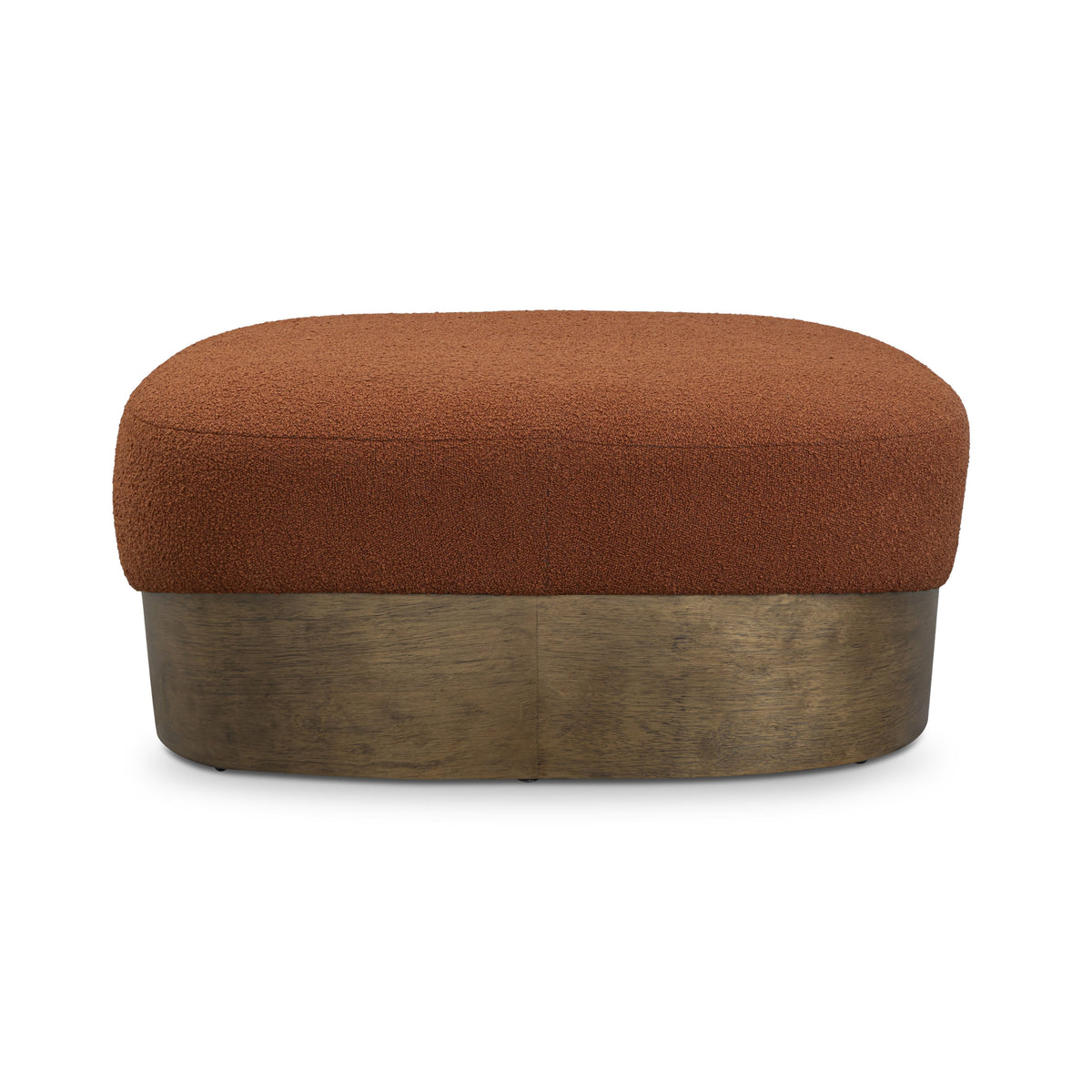 Domina Boucle Ottoman in Autumn Red, straight-on long-side view with the low wood plinth base