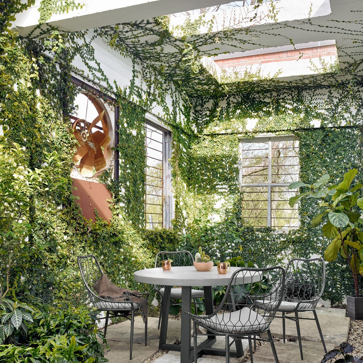 Cyrus Outdoor Round Dining Table Dining Table Four Hands Four Hands, Burke Decor, Mid Century Modern Furniture, Old Bones Furniture Company, Old Bones Co, Modern Mid Century, Designer Furniture, https://www.oldbonesco.com/