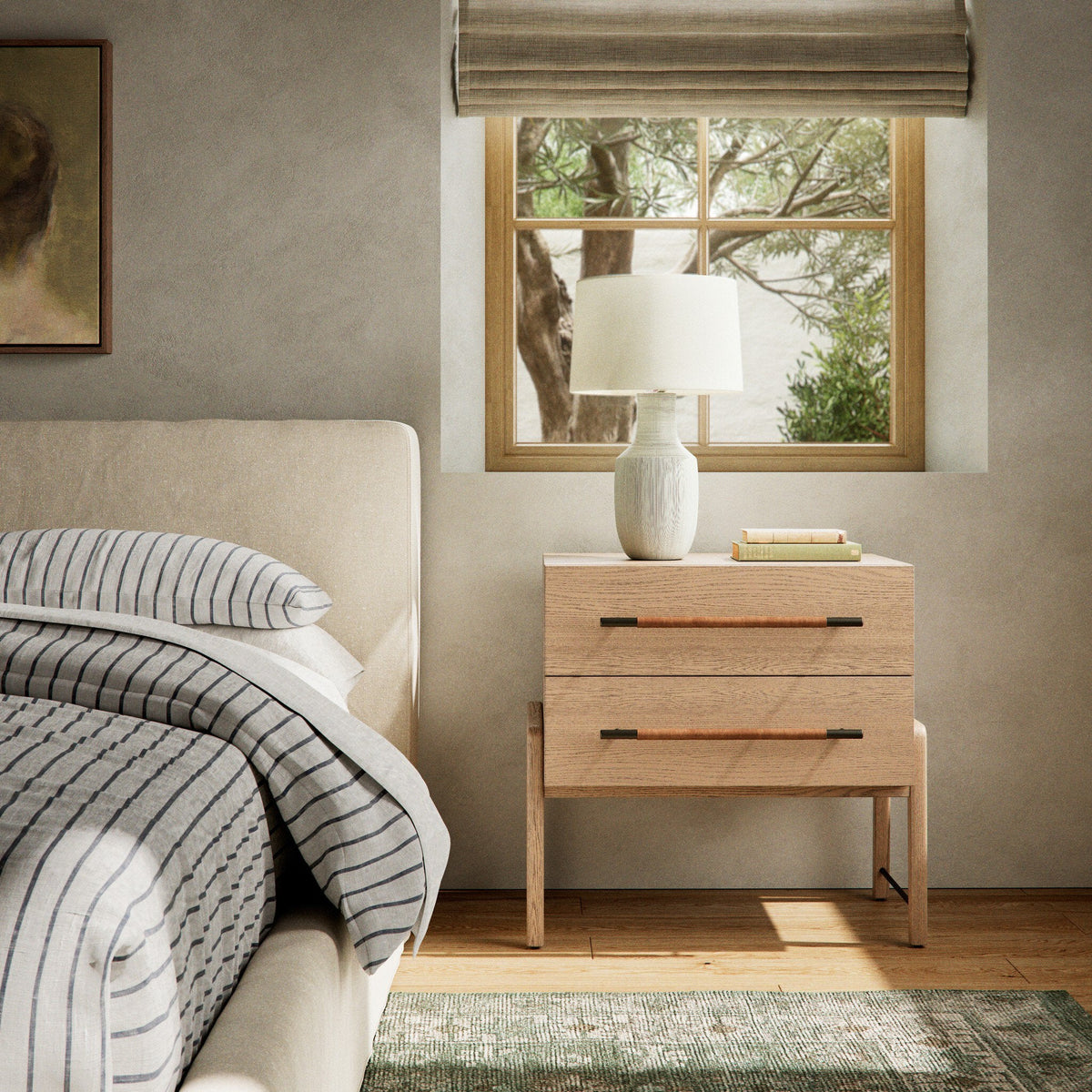 Rosedale Nightstand by Four Hands in a furnished bedroom beside an upholstered bed