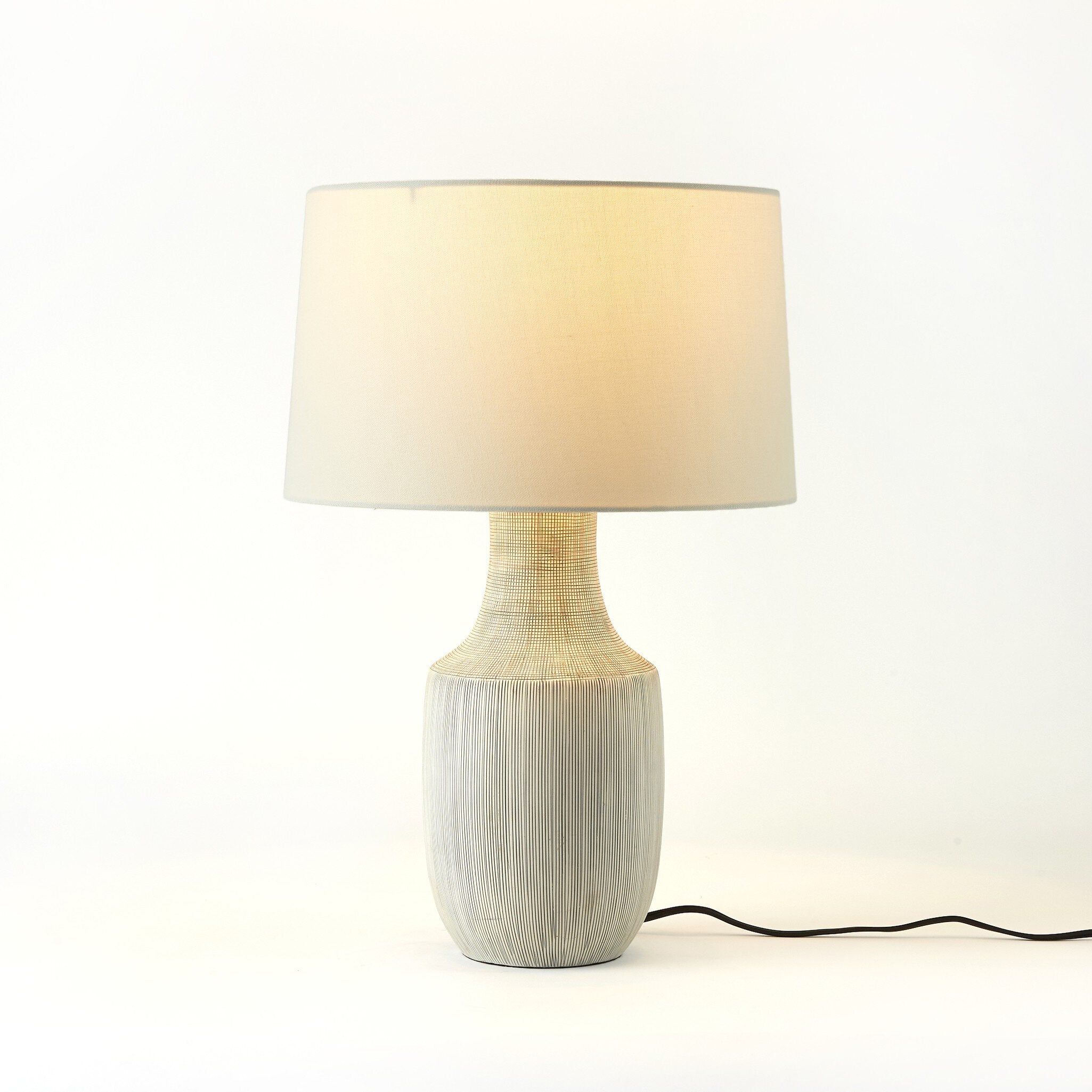 Ombak Table Lamp - Black & White Grid Porcelain Ceramic Table Lamps Four Hands     Table Lamps,https://www.oldbonesco.com,Mid Century Furniture, Furniture Sale, Old Bones Co, Mid Century Sale, Four Hands Furniture, Sale,Gus, Sale,Perigold Ombak Table Lamp - Black & White Grid Porcelain Ceramic Table Lamps Sale, Perigold Sale Ombak Table Lamp - Black & White Grid Porcelain Ceramic,Ombak Table Lamp - Black & White Grid Porcelain Ceramic Lulu and Georgia,Burke Decor Sale Ombak Table Lamp - Black & White Grid P