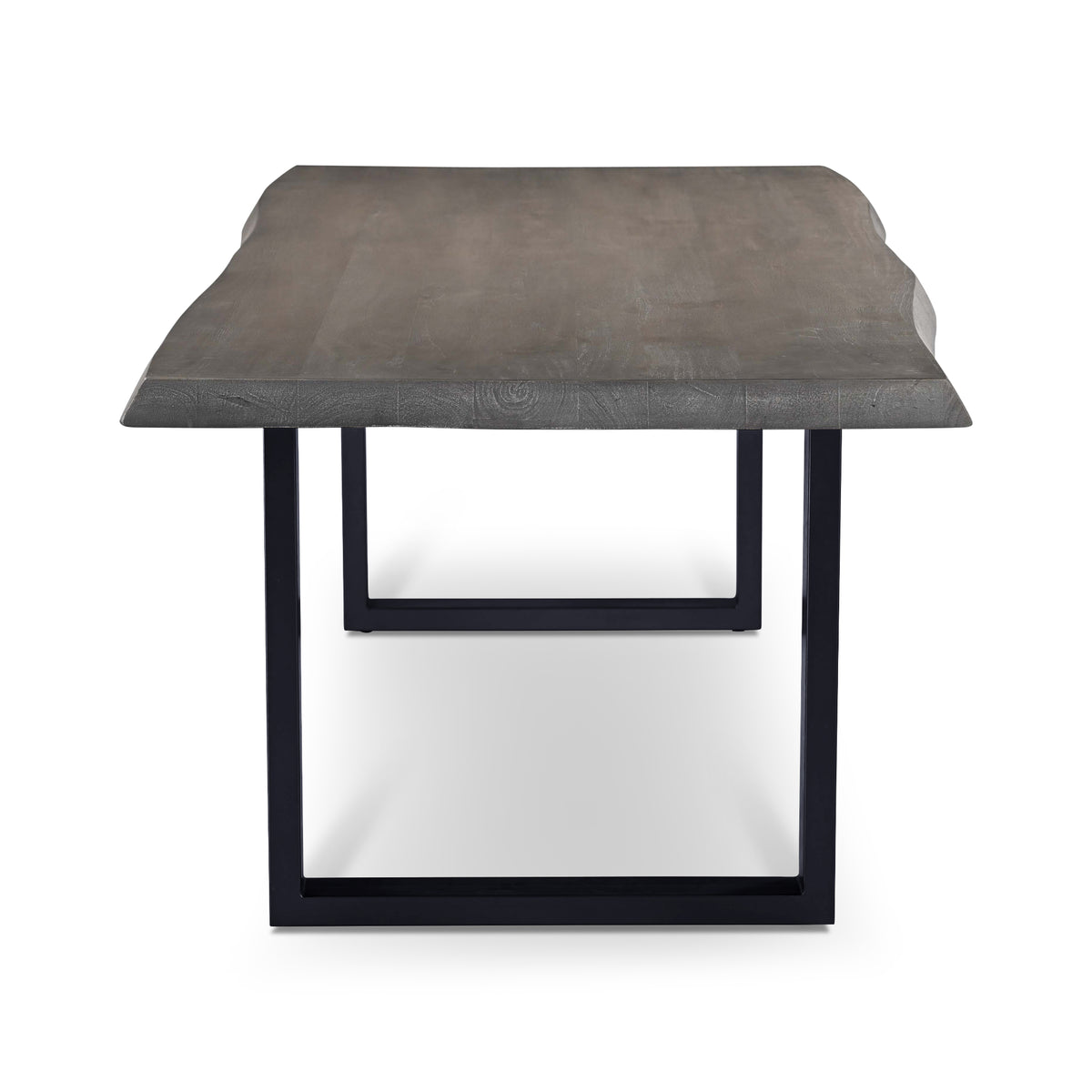 Brooks Dining Table - U Base by Urbia — end view of the gray-toned solid acacia top and black U-shaped frame