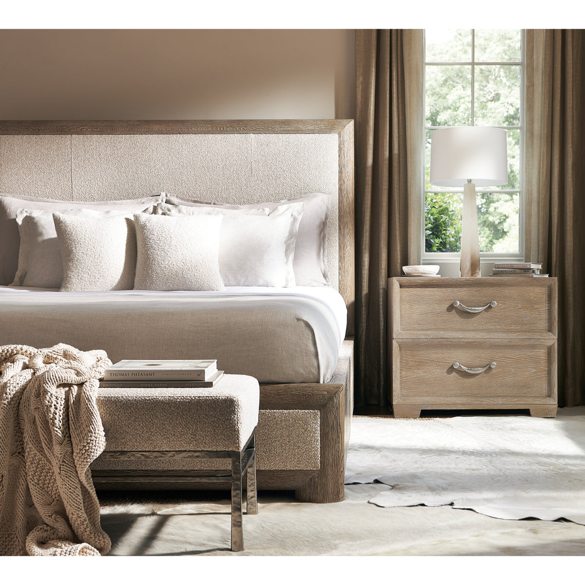 Aventura Upholstered Panel Bed by Bernhardt in a furnished bedroom, close lifestyle view