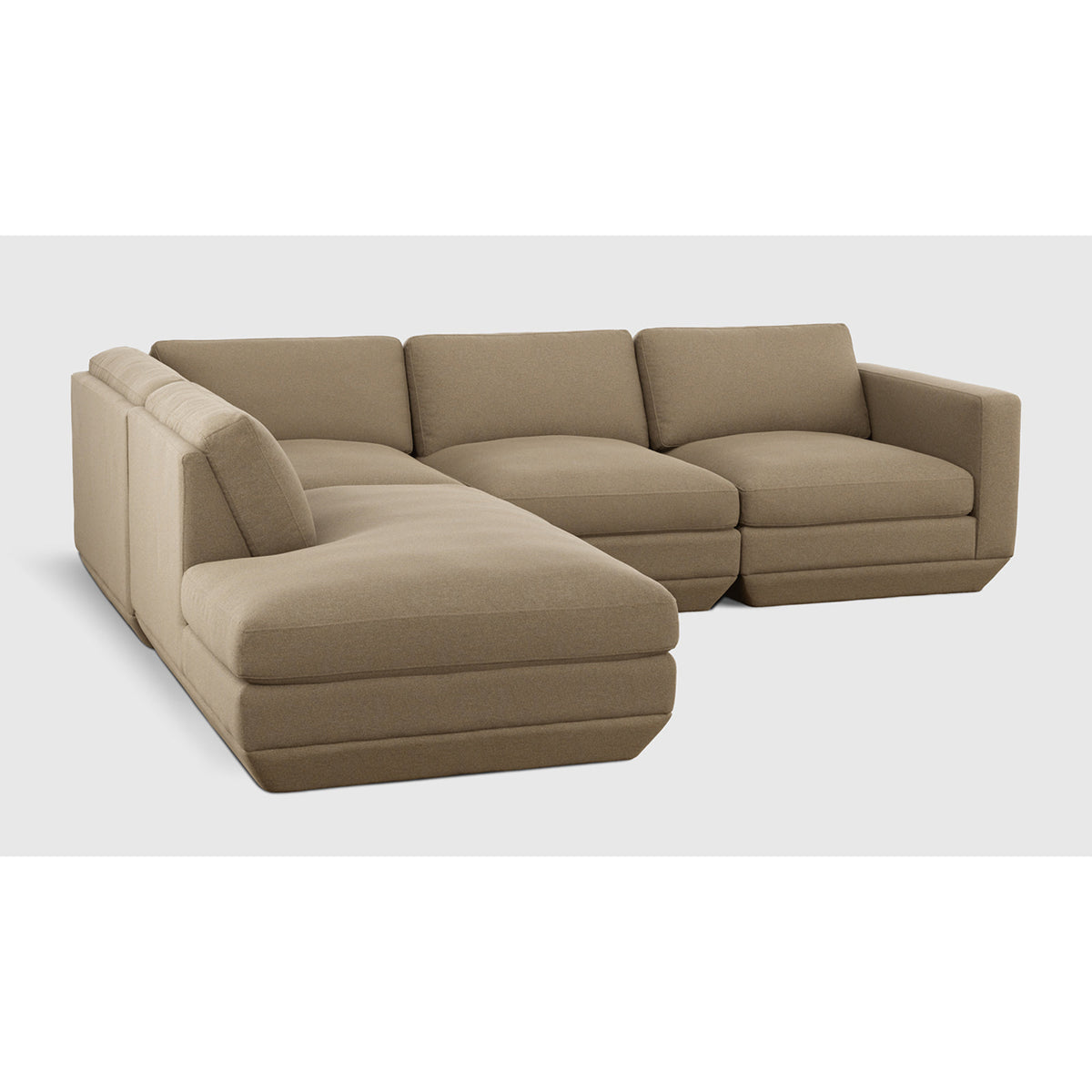 Podium Modular 4PC Lounge Sectional A by Gus* with taupe upholstery, angled view.