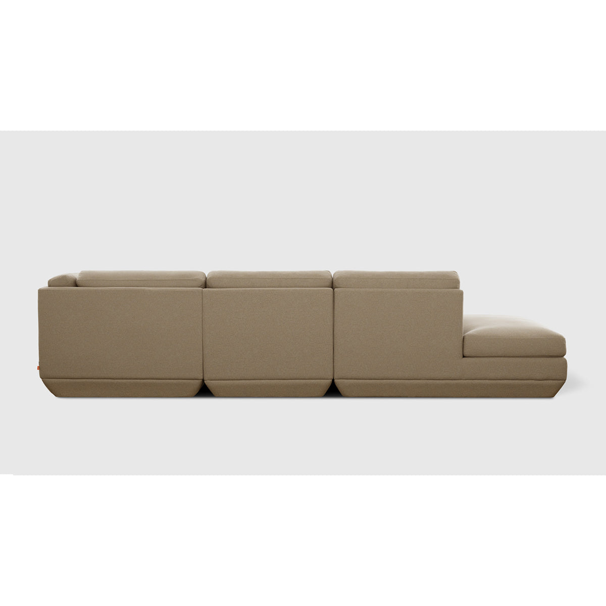 Podium Modular 4PC Lounge Sectional B - RF by Gus* — warm taupe upholstery, rear studio view
