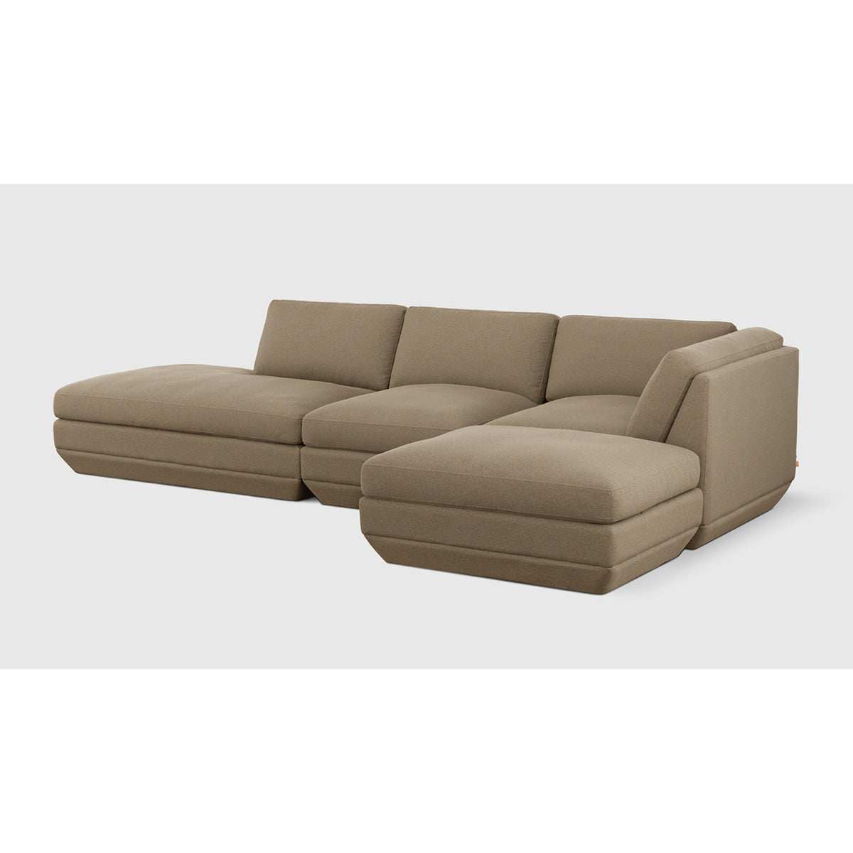 Podium Modular 4PC Lounge Sectional B - RF by Gus* — Merino Mocha upholstery, three-quarter studio view