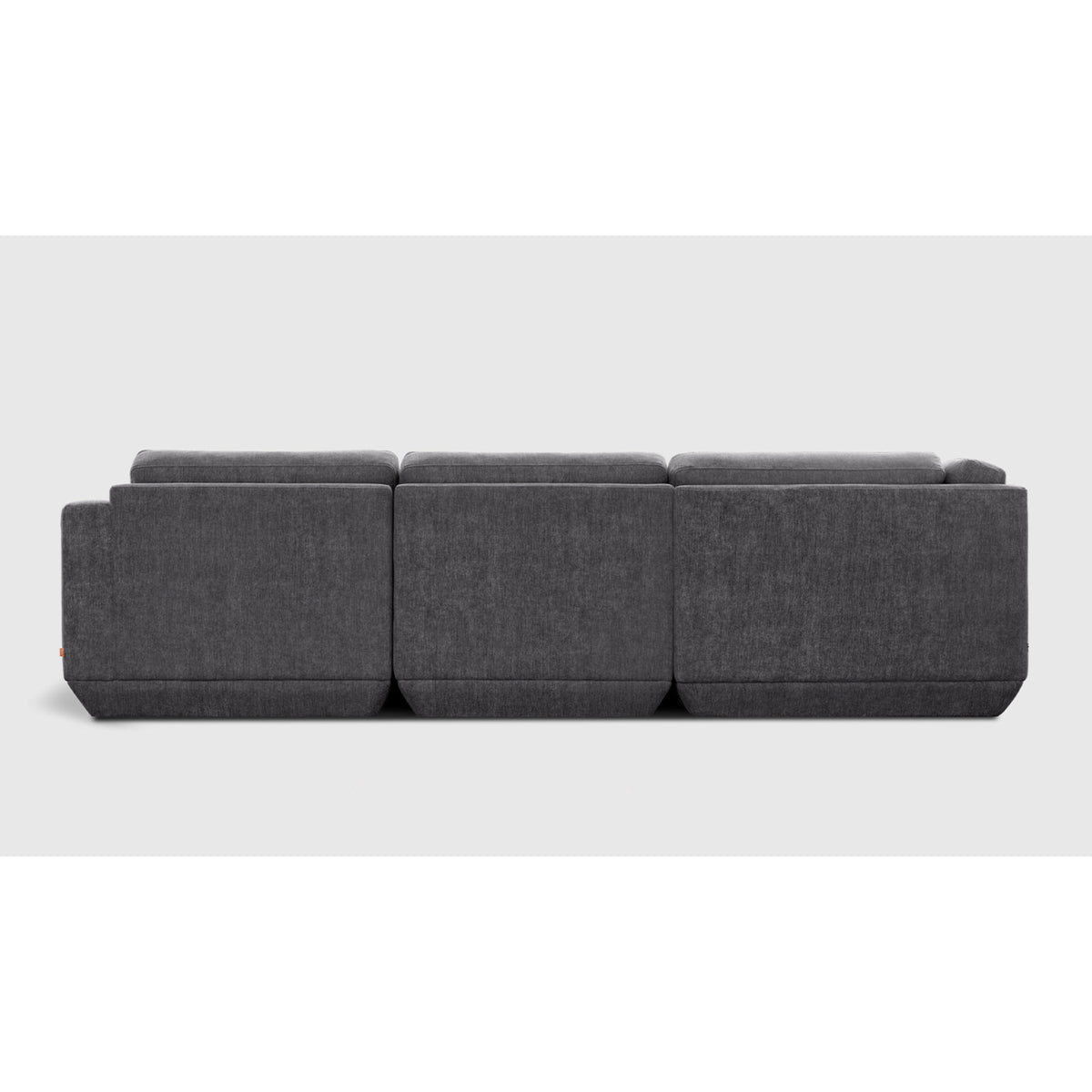 Podium Modular 4PC Lounge Sectional A by Gus* with charcoal upholstery, straight rear view.