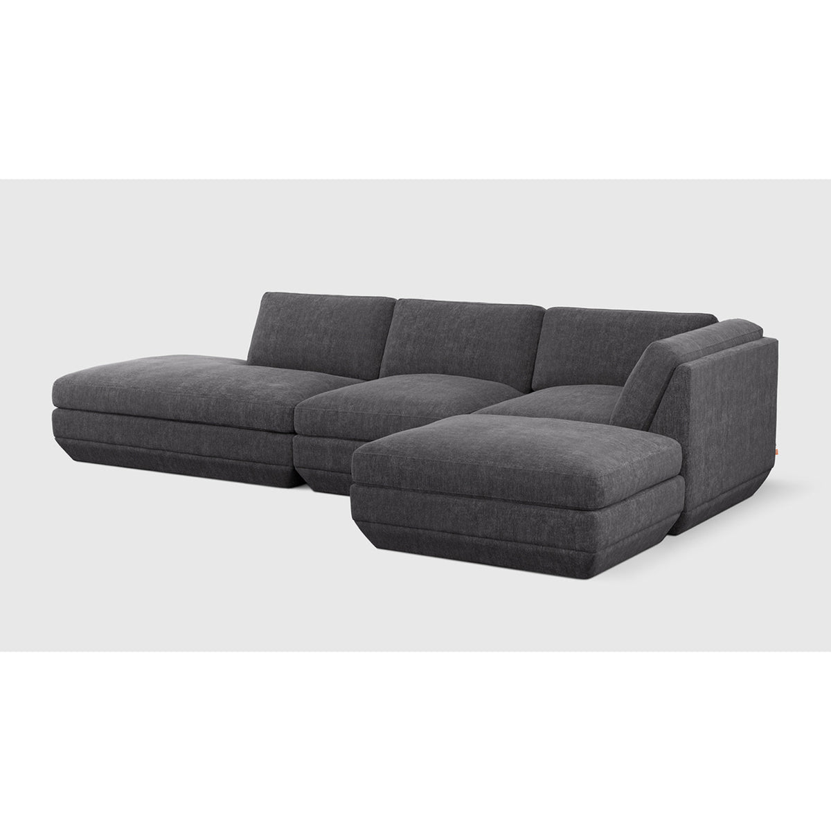 Podium Modular 4PC Lounge Sectional B - RF by Gus* — Bastille Lennox upholstery, three-quarter studio view