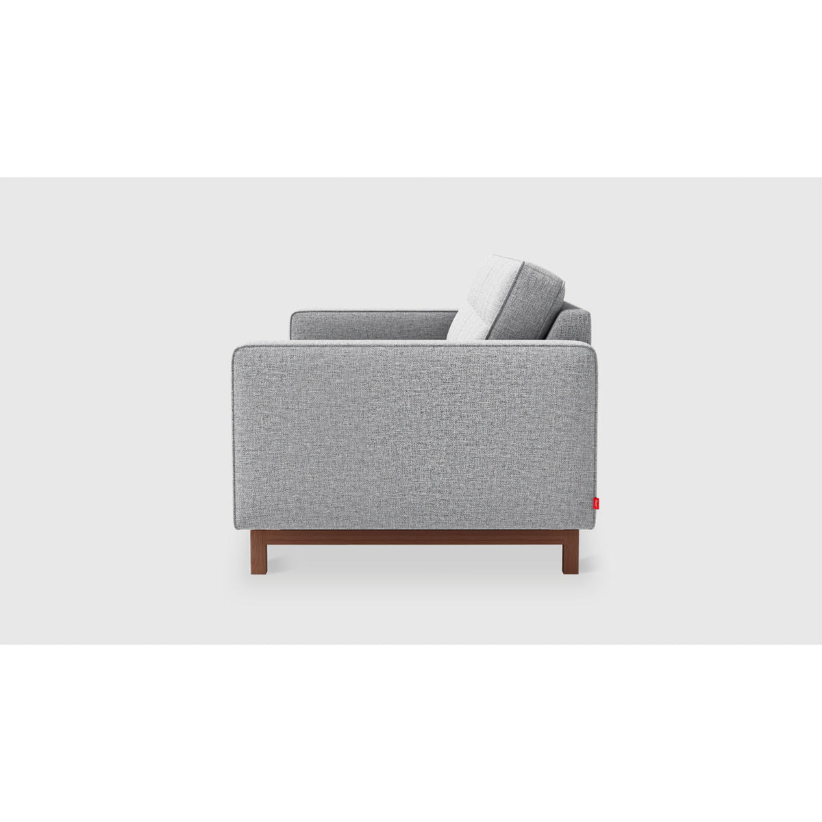 Jane 2 Loft Sofa by Gus* in gray upholstery, side profile showing slim track arms and inset wood base