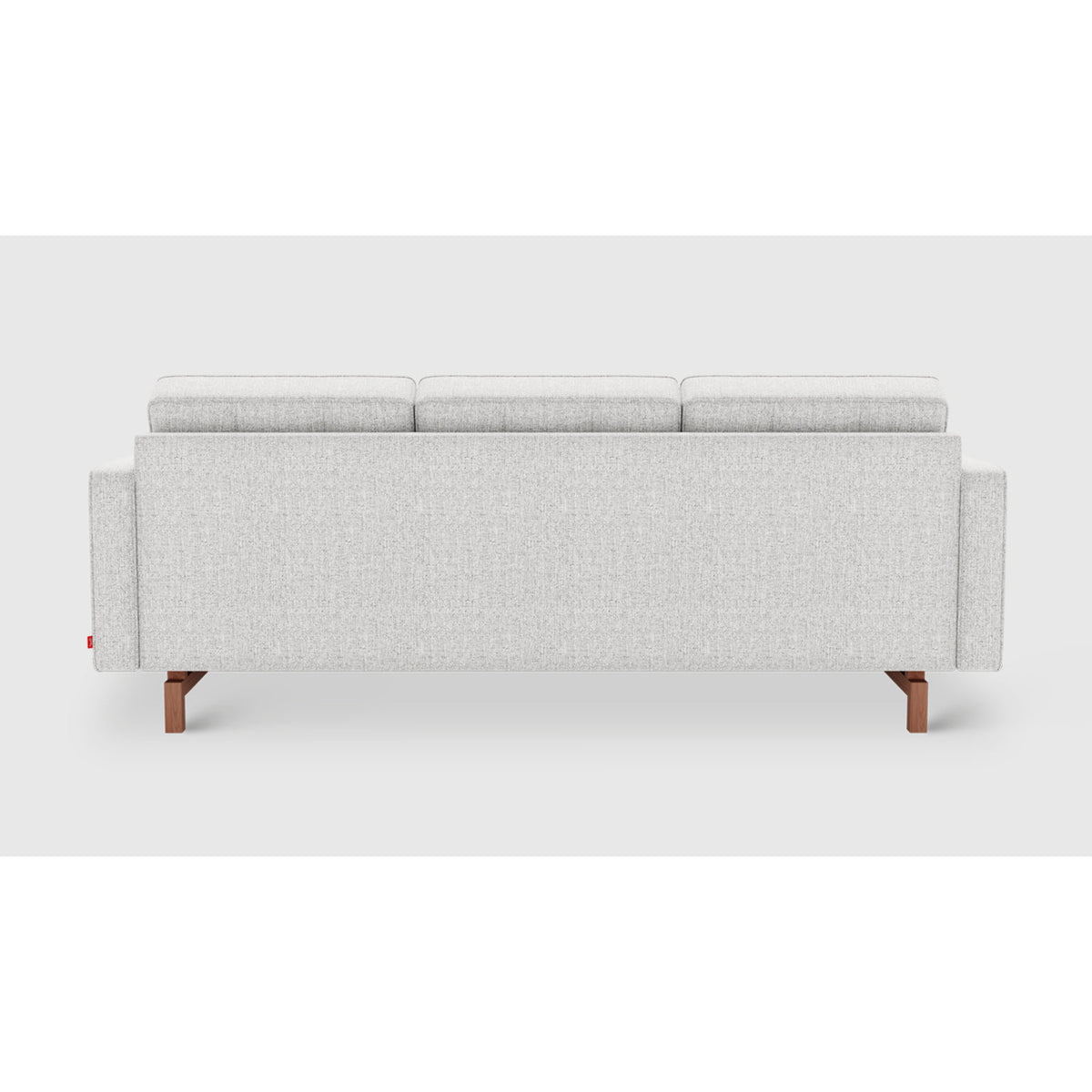Jane 2 Loft Bi-Sectional by Gus* — straight rear view showing the upholstered back and dark wood legs