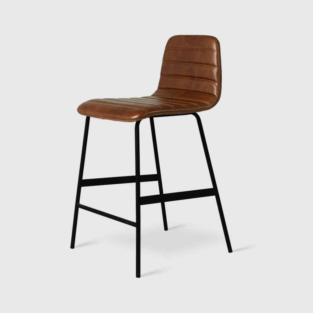 Lecture Counter Stool Upholstered Saddle Brown Leather / BlackChair Gus*  Saddle Brown Leather Black  Four Hands, Mid Century Modern Furniture, Old Bones Furniture Company, Old Bones Co, Modern Mid Century, Designer Furniture, https://www.oldbonesco.com/
