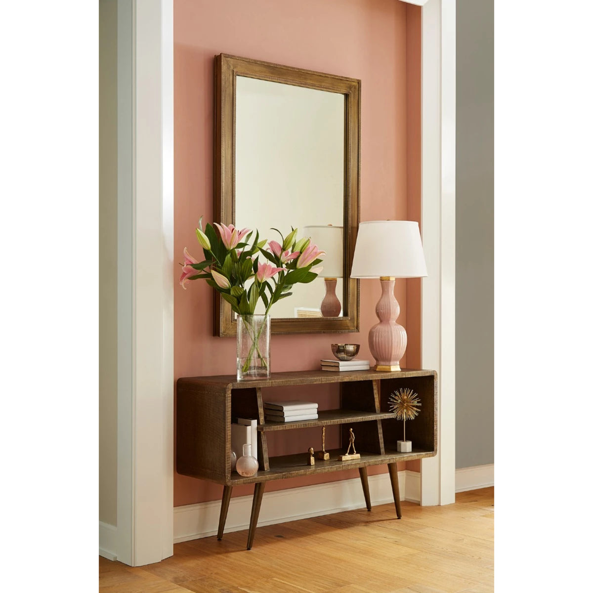 Matteo Vase by Villa & House — clear glass vase filled with pink flowers on an entryway console