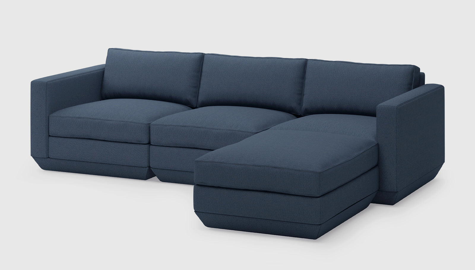 Podium Modular 4PC Sectional Hanson Navy / Right FacingSectionals Gus*  Hanson Navy Right Facing  Four Hands, Mid Century Modern Furniture, Old Bones Furniture Company, Old Bones Co, Modern Mid Century, Designer Furniture, https://www.oldbonesco.com/