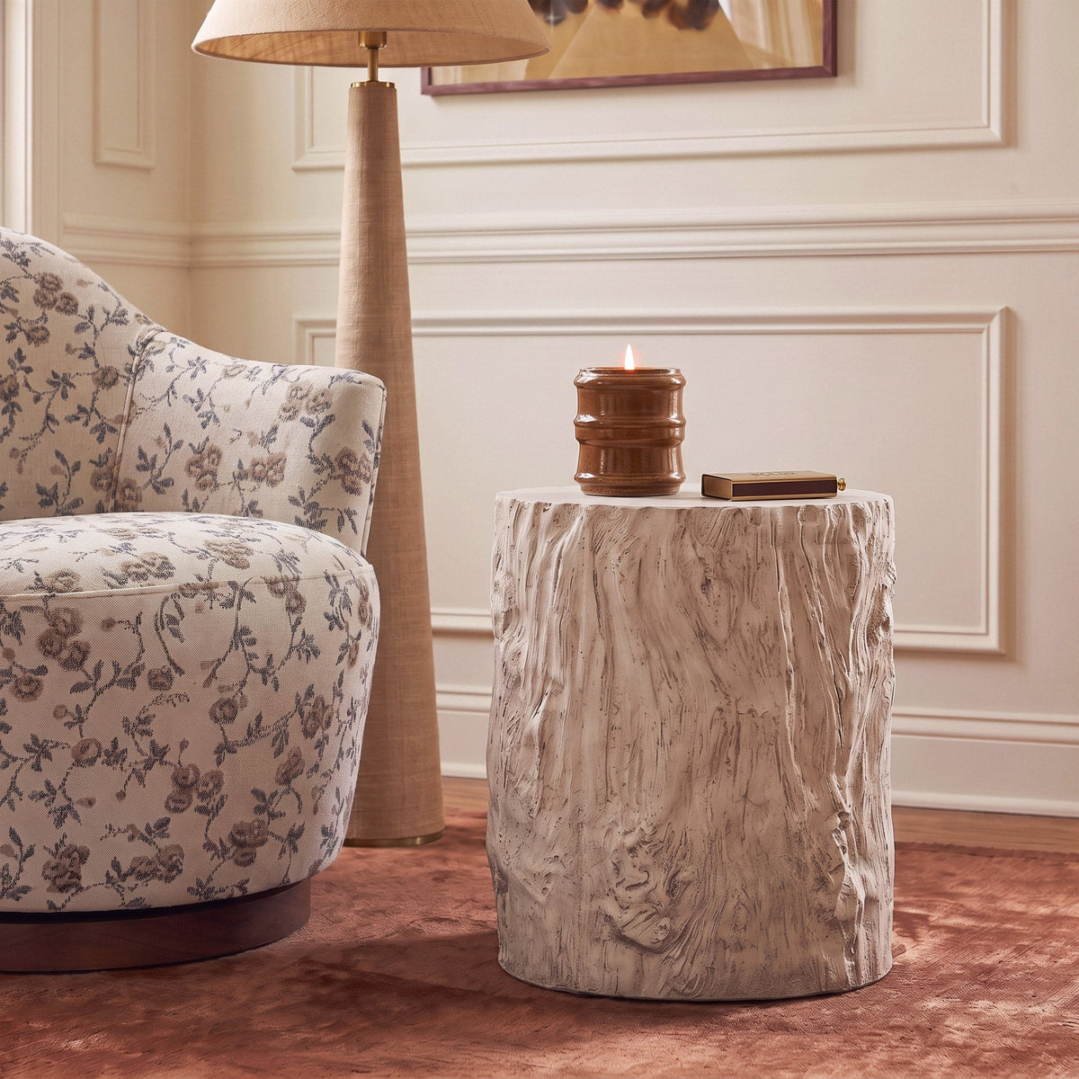 Fawn Driftwood Concrete Indoor/Outdoor Side Table by TOV Furniture beside an accent chair in a living room setting.
