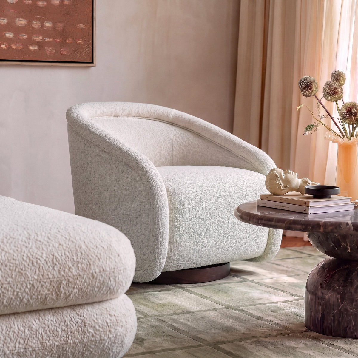 Clarke Cream Performance Boucle Swivel Accent Chair by TOV Furniture in a furnished living room setting.