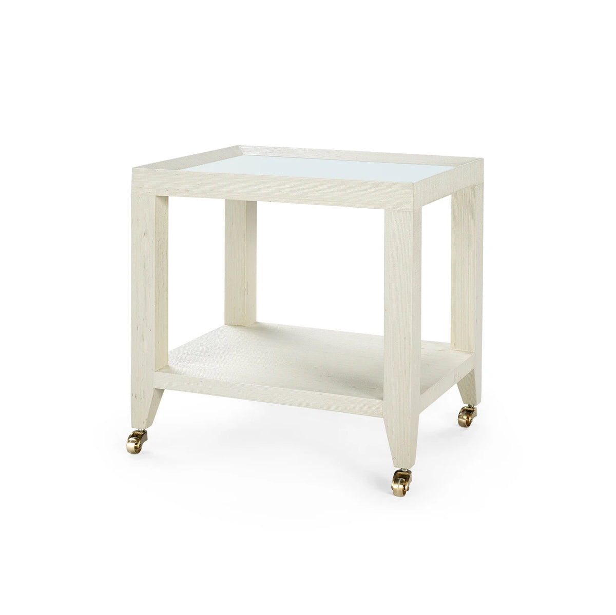 Isadora Tea Table with Glass Top by Villa & House in Canvas Cream — angled view with lower shelf and antique-brass casters.