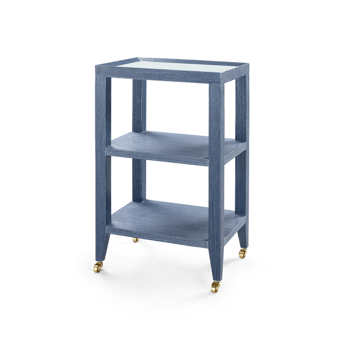 Isadora Side Table with Glass Top by Villa & House in Navy Blue grasscloth, angled view with two shelves and brass-finished casters.